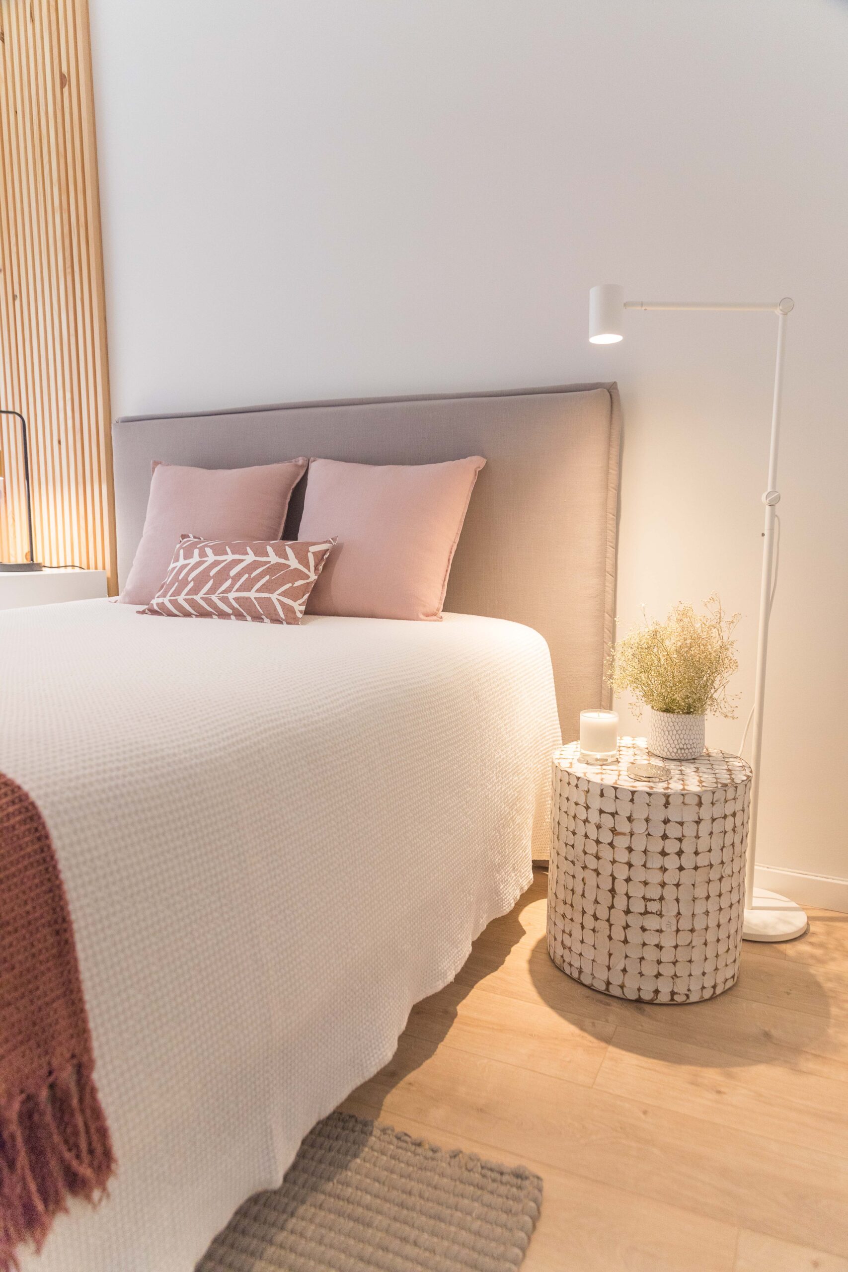 Made bed and tidy bedroom as part of a calming morning routine for anxiety