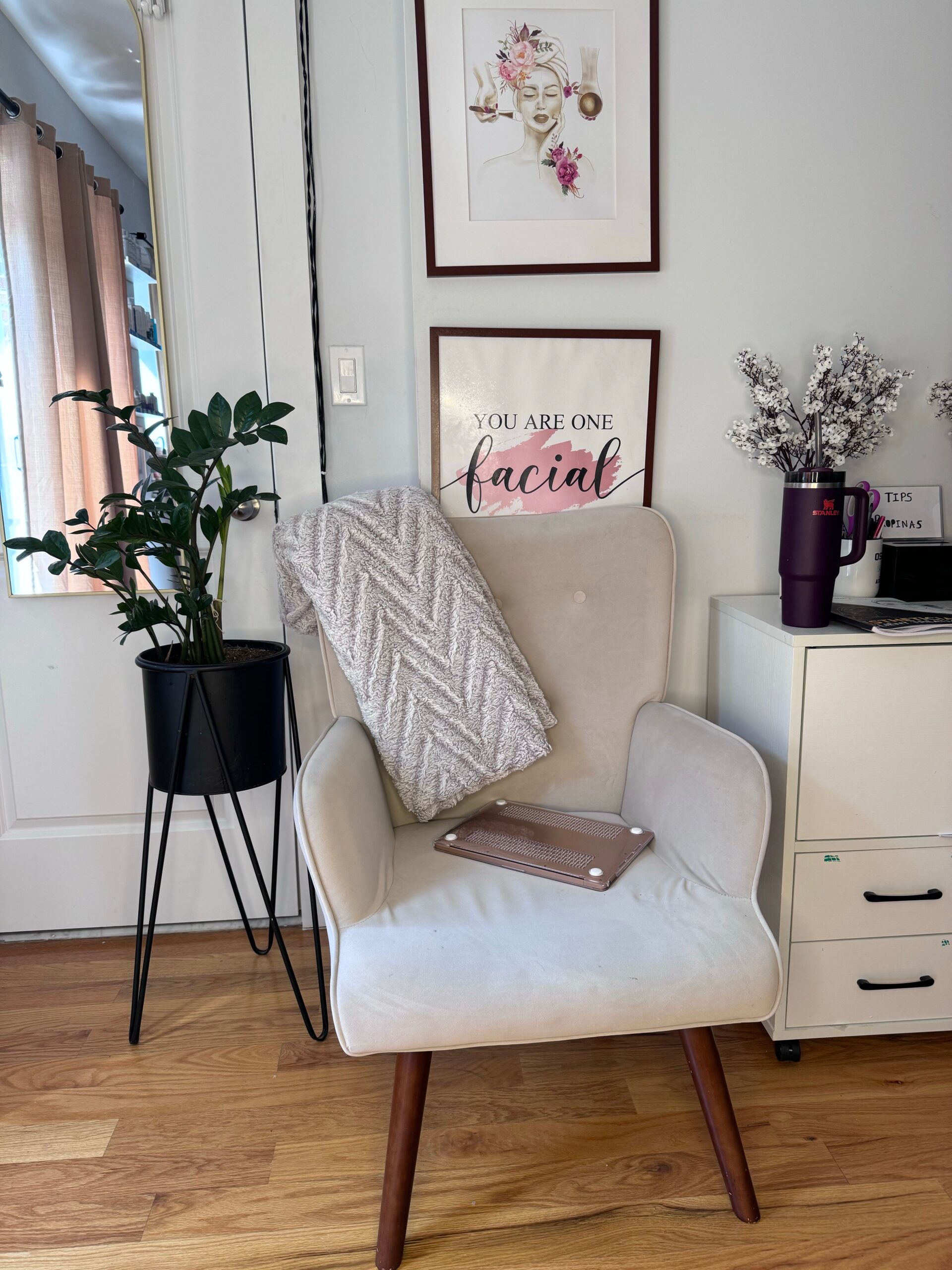 cozy self-care corner with blanket and chair
